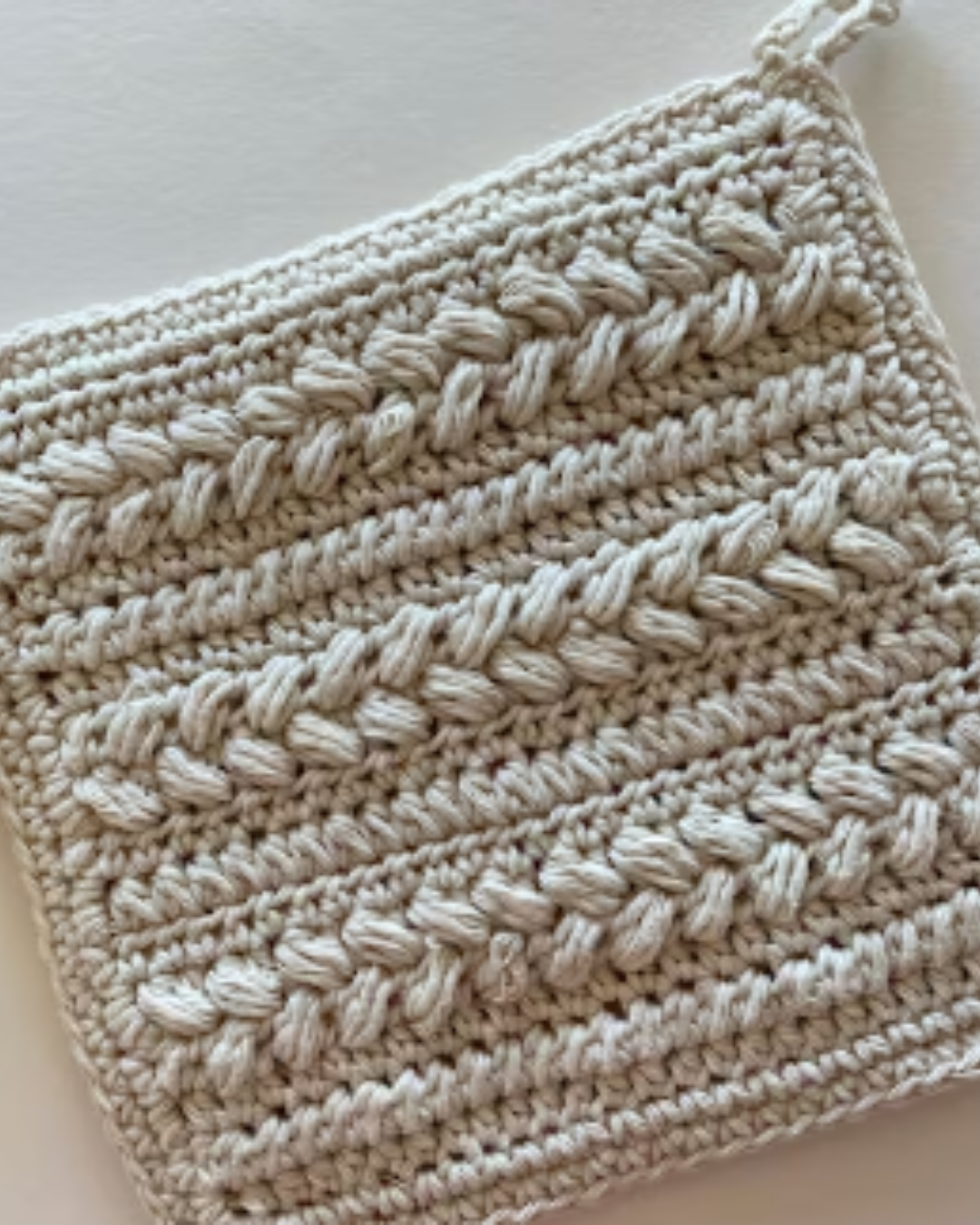 beige textured crochet potholder